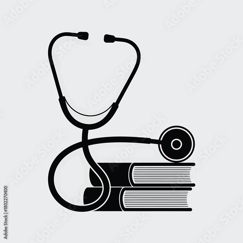 Stethoscope resting on stack of medical textbooks for healthcare education