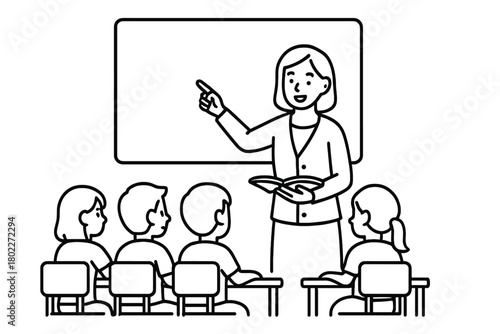 Female instructor pointing at whiteboard guiding seated pupils in modern classroom environment