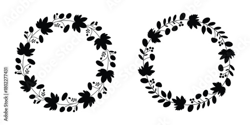 Two oval leafy wreaths silhouette vector isolated on white background