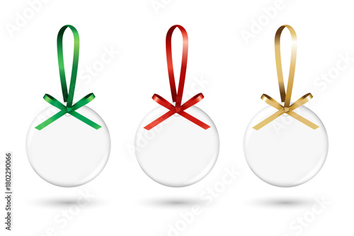 White circle flat clay ornaments mockup with red, green and gold ribbon bow hanger. Blank round hanging ceramic tags or labels element template. Flat porcelain decorations for promotion and events.