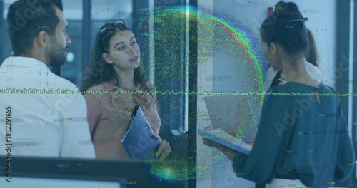 Discussing four-person team in office casual holding blue folder and tablet by glass wall glitching