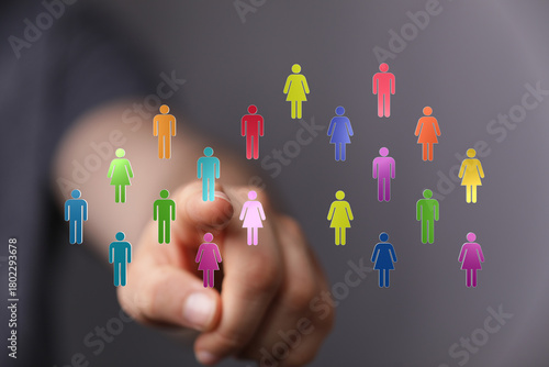 Hand pointing at colorful p...