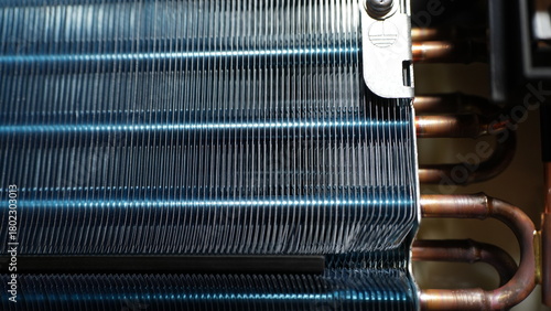 Photos Copper tubes and aluminum fin evaporators coated with blue paint are used for heat dissipation in widely used heat exchangers, such as those found in air conditioners and refrigerant systems