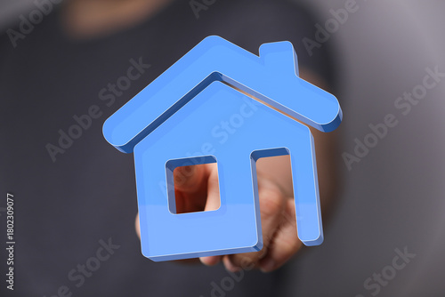 A person's hand holding a b...
