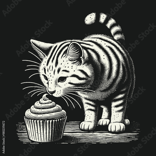 Adorable Striped Kitten Curiously Sniffing a Frosted Cupcake.