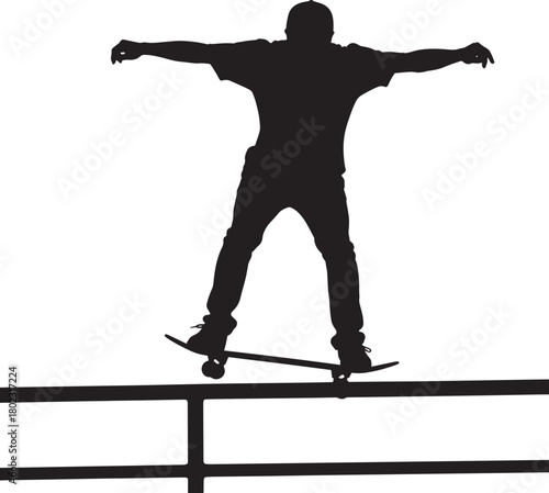 Silhouette of skateboarder grinding on rail showing extreme skill and balance art