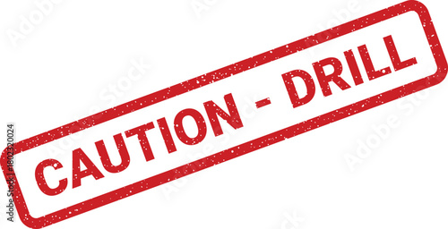 A rectangular red caution drill rubber stamp with textured grunge marks on a clean white surface
