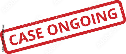 A red rubber stamp with an aged texture clearly shows the words CASE ONGOING on a plain white surface