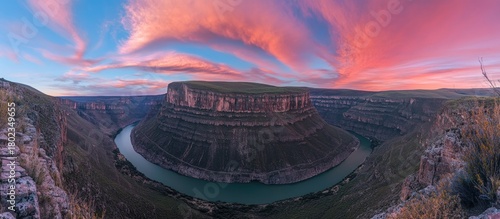 Vast Panoramic View of Sulak Canyon's River Meander Under a Painted Pink Twilight Sky.