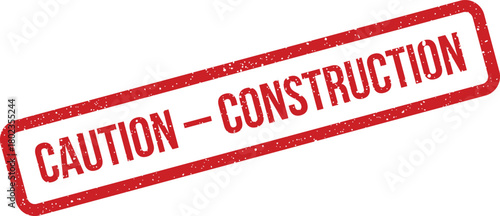 Bold red grunge effect rubber stamp clearly shows the important safety message CAUTION CONSTRUCTION on white