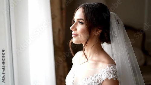 A Radiant Bride's Anticipation Gazing Out the Window on Her Wedding Day