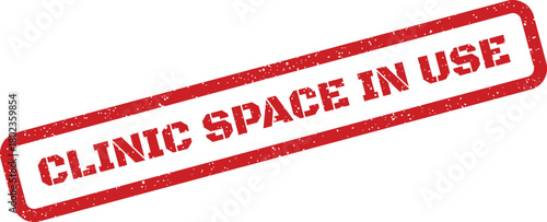 Red grunge rubber stamp impression clearly showing CLINIC SPACE IN USE text on a clean white background
