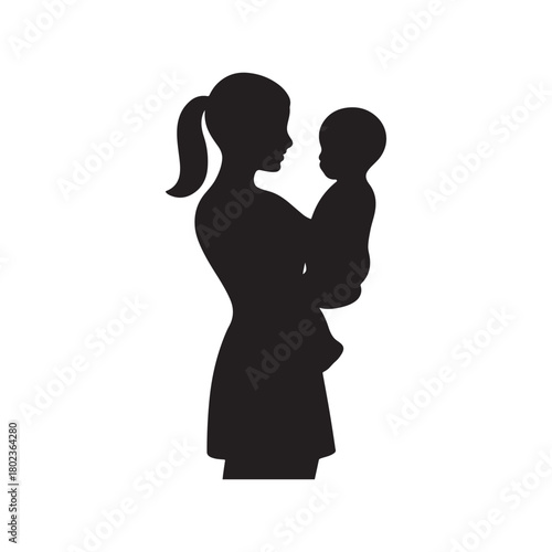 Silhouette of a mother holding her baby tenderly
