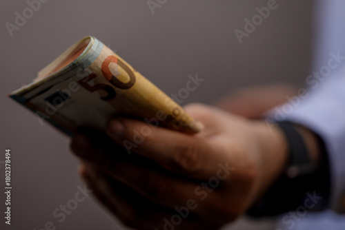 Close-up shot of a hand hol...