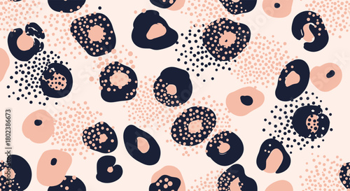Abstract leopard print pattern with dark navy and blush pink spots on a pale beige background, seamless repeat for fashion and interior design.