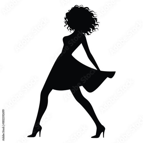 Silhouette shows an African American woman with curly hair striking a pose in heels
