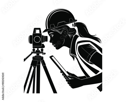 Woman surveyor with hard hat and vest using transit and tablet.