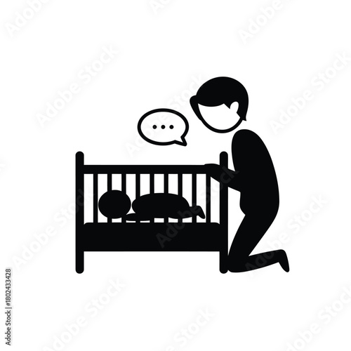 Parent praying beside sleeping baby in crib