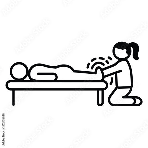 Physical therapist massaging patient s leg on table