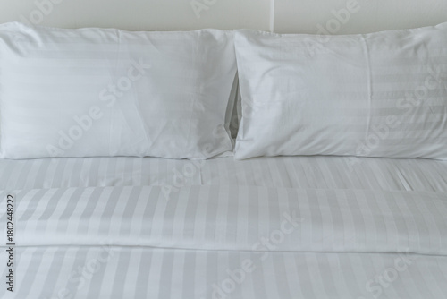 Comfortable soft pillows on the bed in hotel