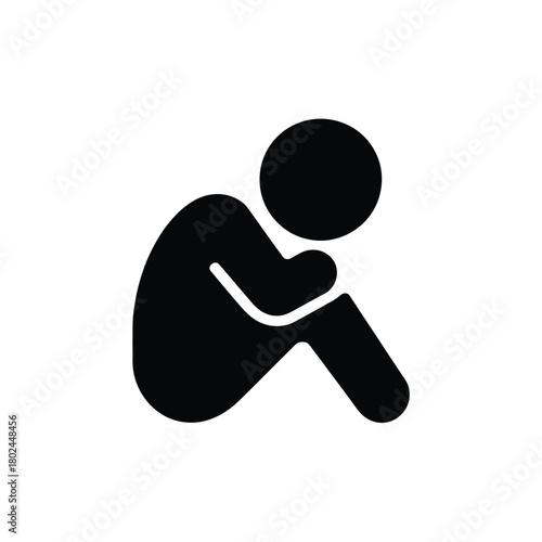 Silhouette of a person curled up in distress