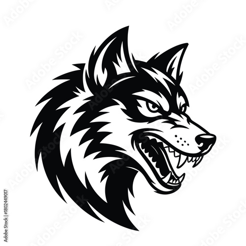 A fierce wolf head, its eyes gleaming with intensity, a symbol of strength and wildness, isolated on a black and white wolf head