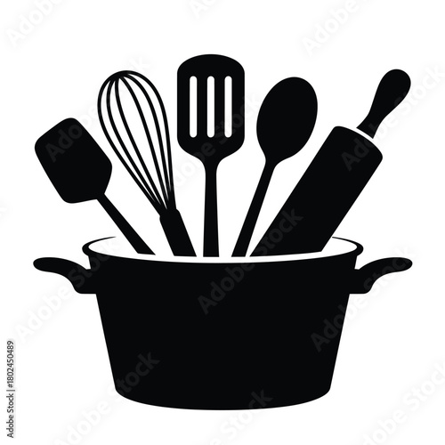 Kitchen utensils in a pot isolated on a collection of essential cooking tools including a whisk, spatula, spoon, and rolling pin for culinary creations