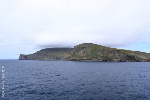 view to the Island Foula in the Shetland archipelago of Scotland from the sea