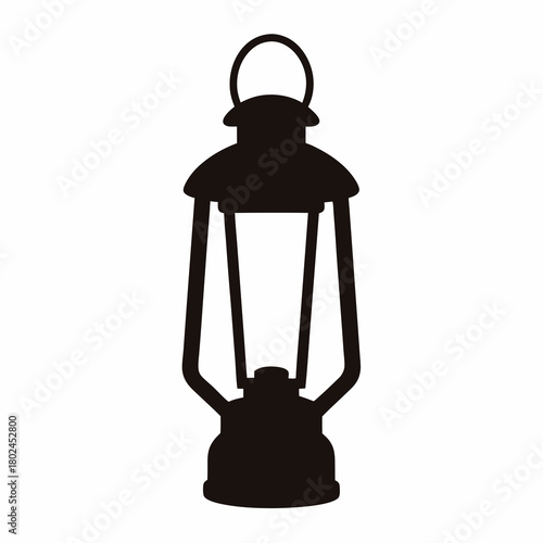 Silhouette of an antique oil lamp or lantern used for lighting