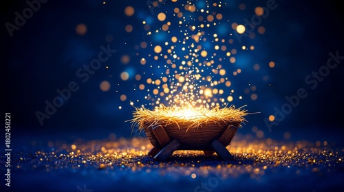Symbolic native scene of a glowing manger with straw. The birth of Jesus Christ concept with golden sparkling lights. Holy Christmas background