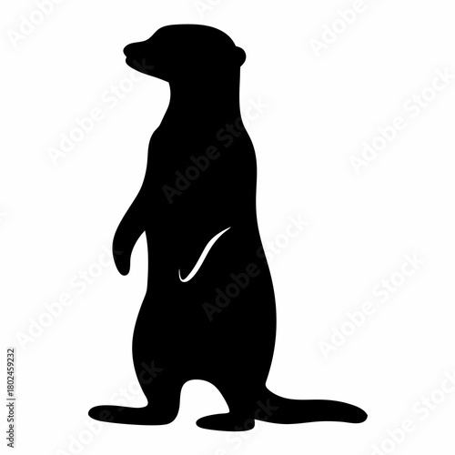 Silhouette of a meerkat standing alert on its hind legs, watchful
