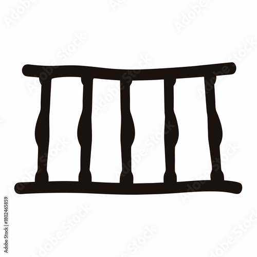 Silhouette of a sturdy black wooden fence or barrier with four sections