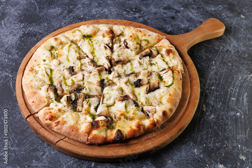 Gourmet Mushroom Cheese Pizza On Circular Wooden Board
