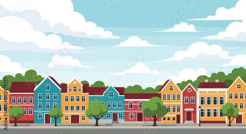 A colorful row of Scandinavian-style houses on a sunny day with fluffy clouds.