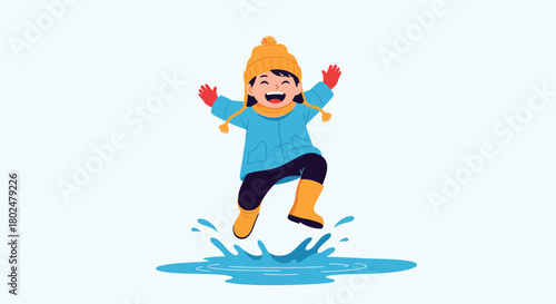 A joyful young child in winter clothes jumps with excitement through a puddle.