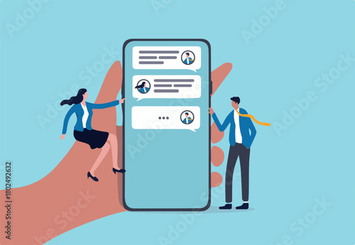 Chat Mobile application for business, teamwork using technology to communicate or collaborate in work concept, businessman and businesswoman communicate with mobile app on big hand holding smart phone
