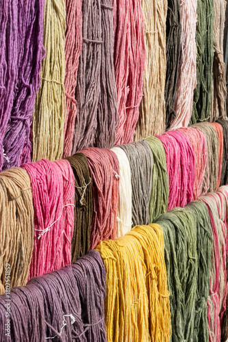 Pure wool yarn in various colors hanging - Vertical orientation