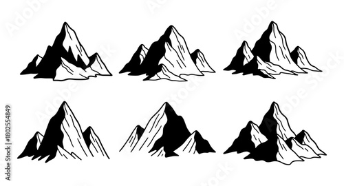 Mountain silhouette collection: bold black and white peaks set against white background