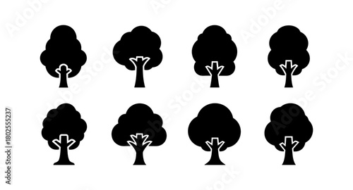 Green tree icon set featuring eight minimalist tree designs for eco-friendly projects