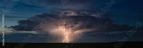 Storm with lightning over landscape