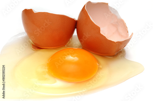 Broken egg with shells on white background