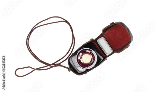 Vintage photo light meter isolated on white background