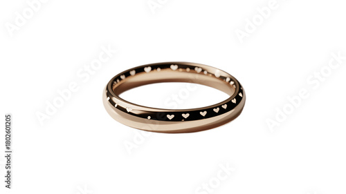 Elegant and minimalist golden ring with heart pattern.
