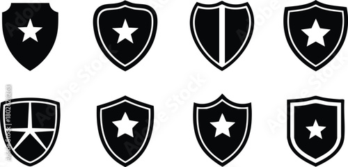 Shield icons with star and cross symbols in black and white simple vector design for security and protection concepts 