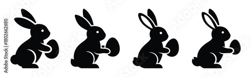 bunny holding egg Easter silhouette art, black color and white background