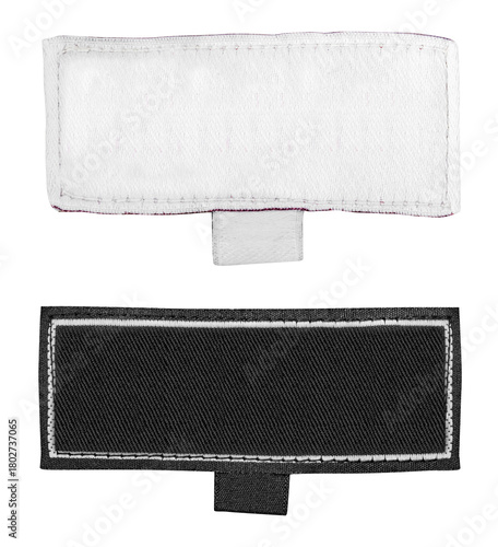 Vászonkép Isolated photo of black and white colored cloth label with stitched borders on white background