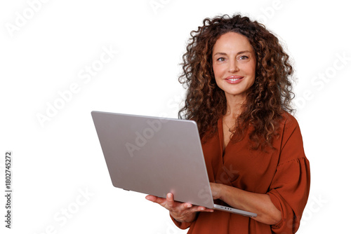 Professional woman with curly hair holding a laptop and smiling, embracing technology and business innovation, transparent background