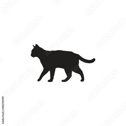 A silhouette of a cat walking with its tail slightly raised on a white background in a simple style