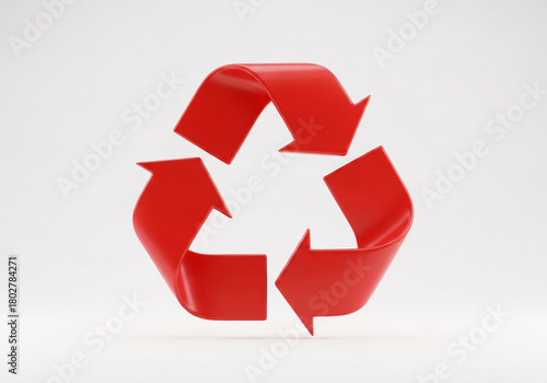 Red recycling symbol with three chasing arrows in a circular motion, isolated on a white background with subtle lighting and soft shadows. isolated on white background