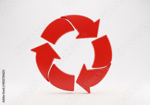 Red 3d recycling arrows symbol rotating in a continuous loop on a clean white background, representing circular economy and sustainability isolated on white background